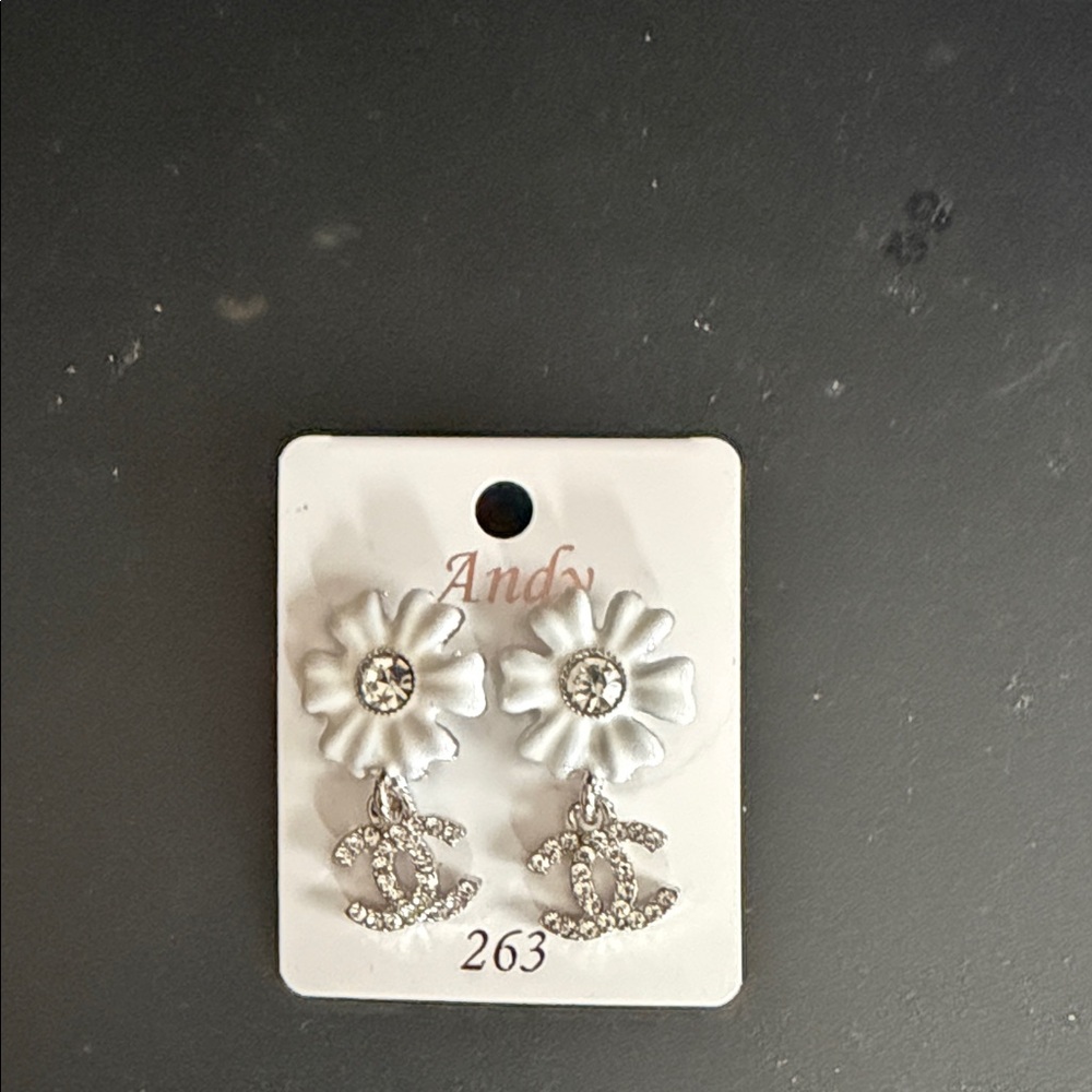 White Flower Drop Earrings with Fashion Inspired Logo Charm